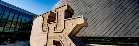 Large stone statue of UK logo outside the Gatton Student Center entrance